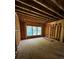 Bright living room with framed windows and a rough floor ready for your custom flooring selections at 314 Fortune Ne St # A, Atlanta, GA 30312