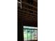 Window framed with exposed studs and view of trees at 314 Fortune Ne St # A, Atlanta, GA 30312