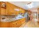 Kitchen features stainless steel appliances, granite counters, and wooden cabinets at 5670 Lanny Dr, Powder Springs, GA 30127