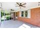 Spacious screened-in porch with ample room for seating and entertaining at 5670 Lanny Dr, Powder Springs, GA 30127