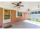 Screened-in porch area with ceiling fans, perfect for relaxing outdoors at 5670 Lanny Dr, Powder Springs, GA 30127