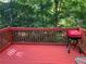 Outdoor deck space with a red grill, perfect for enjoying outdoor cooking at 1005 Timbervale Ln, Lithonia, GA 30058