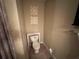 This bathroom has neutral paint, white toilet, and decorative accents on the wall at 1005 Timbervale Ln, Lithonia, GA 30058