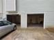 This three-car garage has concrete flooring and gray doors with a car parked out front at 1005 Timbervale Ln, Lithonia, GA 30058
