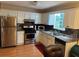 Functional kitchen featuring stainless steel appliances, ample counter space, and sleek cabinetry at 1005 Timbervale Ln, Lithonia, GA 30058