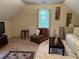 This living room has large windows, neutral paint, and a soft rug at 1005 Timbervale Ln, Lithonia, GA 30058