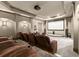 Dedicated home theater features reclining seats, a large screen, and surround sound for immersive entertainment at 5507 Aviemore Ct, Suwanee, GA 30024