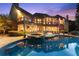 Beautiful backyard with a sparkling pool, spa, and outdoor seating areas for entertaining and relaxation at 5507 Aviemore Ct, Suwanee, GA 30024