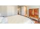 Bedroom featuring a wardrobe, a closet, and access to the bathroom at 1432 Arbor Bluff Ct, Lawrenceville, GA 30045