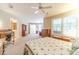 Bright bedroom with carpet, natural lighting, and traditional furnishings at 1432 Arbor Bluff Ct, Lawrenceville, GA 30045