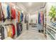 Walk-in closet featuring custom shelving for optimal storage and organization at 1432 Arbor Bluff Ct, Lawrenceville, GA 30045