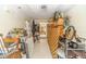 Cluttered storage room with shelving, various tools, and miscellaneous household items at 1432 Arbor Bluff Ct, Lawrenceville, GA 30045