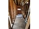 Bathroom with a tub under construction, featuring exposed wooden beams and plumbing fixtures in progress at 314 Fortune Ne St # B, Atlanta, GA 30312