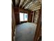 Picture of a bedroom in progress with wooden framing and a window showcasing room's potential at 314 Fortune Ne St # B, Atlanta, GA 30312