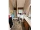 Bathroom featuring a soaking tub, separate shower, and wood vanity at 856 Haydens Rdg, Ellenwood, GA 30294