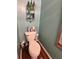 Powder room featuring a toilet, mirror, and a small vanity at 856 Haydens Rdg, Ellenwood, GA 30294