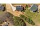 Aerial view of the home, showcasing the layout, surrounding greenery, and neighborhood at 81 Bridgemill Dr, Douglasville, GA 30134