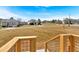 View from deck showcases the property's generous lot and neighborhood charm on a sunny day at 81 Bridgemill Dr, Douglasville, GA 30134