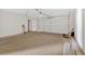 Spacious two-car garage featuring a large garage door and ample room for parking and storage at 81 Bridgemill Dr, Douglasville, GA 30134