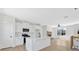 Beautiful kitchen featuring a large island, stone fireplace and stainless steel appliances at 81 Bridgemill Dr, Douglasville, GA 30134