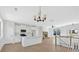 Open-concept layout with kitchen featuring a center island, open to the living space at 81 Bridgemill Dr, Douglasville, GA 30134