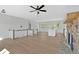 Spacious living room featuring hardwood floors, fireplace, and natural light at 81 Bridgemill Dr, Douglasville, GA 30134