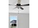 Primary bedroom with ceiling fan and bright window at 81 Bridgemill Dr, Douglasville, GA 30134