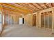 Unfinished basement room framed out with exposed insulation at 81 Bridgemill Dr, Douglasville, GA 30134