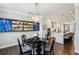 The dining room is open to kitchen, and features a decorative chandelier at 2447 Figaro Dr, Atlanta, GA 30339
