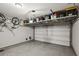 Spacious garage with overhead storage and a clean, organized appearance at 2447 Figaro Dr, Atlanta, GA 30339