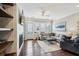 Relax in this living room featuring a white brick fireplace and many windows for ample light at 2447 Figaro Dr, Atlanta, GA 30339