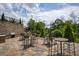 Community outdoor patio area with multiple seating areas, a barbecue, and well-manicured landscaping at 2447 Figaro Dr, Atlanta, GA 30339