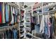 Well-organized walk-in closet featuring shelving and hanging rods for optimal storage and organization at 2447 Figaro Dr, Atlanta, GA 30339