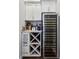 Convenient wine storage with a cooler and built-in rack for storage of your wine collection at 2447 Figaro Dr, Atlanta, GA 30339