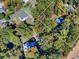 Aerial view of a wooded lot with mature trees and a home visible in the canopy at 3534 Dahlonega Hwy, Cumming, GA 30028
