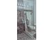 Modern bathroom with glass shower, pebble floor, and decorative marble wall at 1542 Riderwood Ct, Decatur, GA 30033