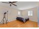 Bright bedroom with hardwood floors, windows and minimal furniture at 1542 Riderwood Ct, Decatur, GA 30033