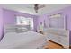 Bright bedroom with ample natural light, hardwood floors, and modern furniture at 1542 Riderwood Ct, Decatur, GA 30033
