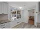 Bright kitchen nook area featuring wood flooring, large windows and view to outdoors at 1542 Riderwood Ct, Decatur, GA 30033