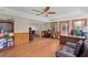 Spacious room with hardwood floors, large windows, and ceiling fan offering great lighting at 1542 Riderwood Ct, Decatur, GA 30033