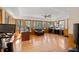Spacious room with hardwood floors, large windows, and ceiling fan offering great lighting at 1542 Riderwood Ct, Decatur, GA 30033