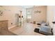 Bonus room with neutral walls features a cat tower and multiple pet beds at 15 Fairwoods Ct, Covington, GA 30016