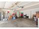 Spacious garage with ample storage and overhead lighting at 15 Fairwoods Ct, Covington, GA 30016