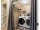 Well-equipped laundry room with modern washer and dryer at 15 Fairwoods Ct, Covington, GA 30016