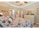 Spacious main bedroom with tray ceiling and dresser at 15 Fairwoods Ct, Covington, GA 30016
