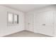 The bedroom offers a window and a closet with double doors at 2930 Torreya Way # 2930, Marietta, GA 30067