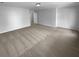 Large bedroom featuring neutral carpet and a smooth ceiling with inset lighting at 324 Stoney Hollow Rd, Canton, GA 30114