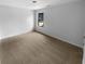 Bedroom showcasing neutral paint, carpeting, and a view from the window at 324 Stoney Hollow Rd, Canton, GA 30114