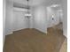 Open dining room featuring a modern chandelier and neutral carpeting at 324 Stoney Hollow Rd, Canton, GA 30114