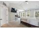 Bright bedroom with vaulted ceiling, lots of natural light, sitting area and hardwood floors at 538 Mulberry Fern Dr, Auburn, GA 30011